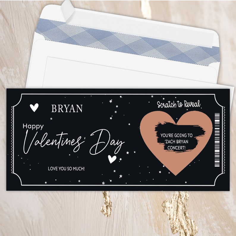 K&ouml;nnte beinhalten: Eine schwarz-wei&szlig;e Rubbelkarte mit einem rosa Herzen und dem Text "Happy Valentine's Day" und "BRYAN". Die Karte hat auch den Text "Scratch to Reveal" und "You're going to Zach Bryan concert!"