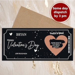 K&ouml;nnte beinhalten: Eine schwarze Rubbelkarte mit einem rosa Herz und dem Text "Happy Valentine's Day" und "LOVE YOU SO MUCH!" Die Karte enth&auml;lt auch den Text "BRYAN" und "Scratch to Reveal" sowie ein rosa Herz mit dem Text "YOU'RE GOING TO ZACH BRYAN CONCERT!"