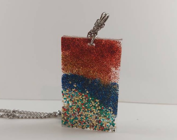 Pride rainbow pendant with silver glitter accent on silver chain