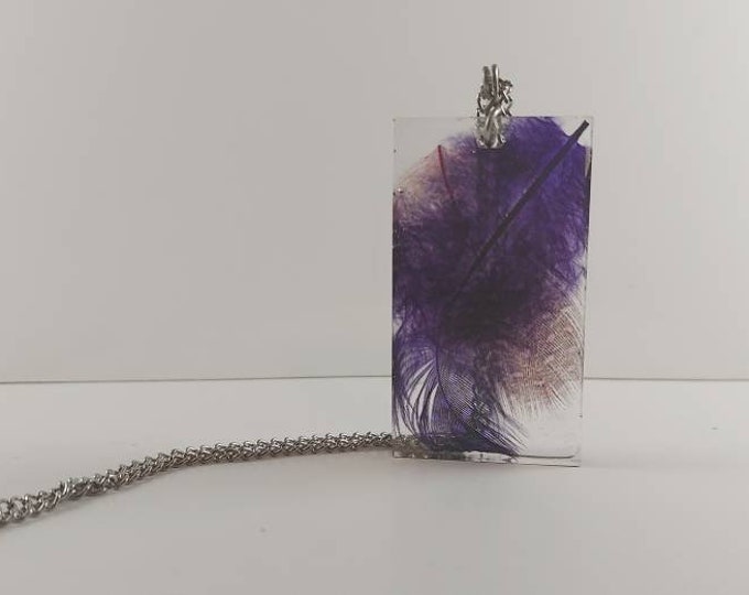 Purple and pink feathers resin pendent on 18' silver chain