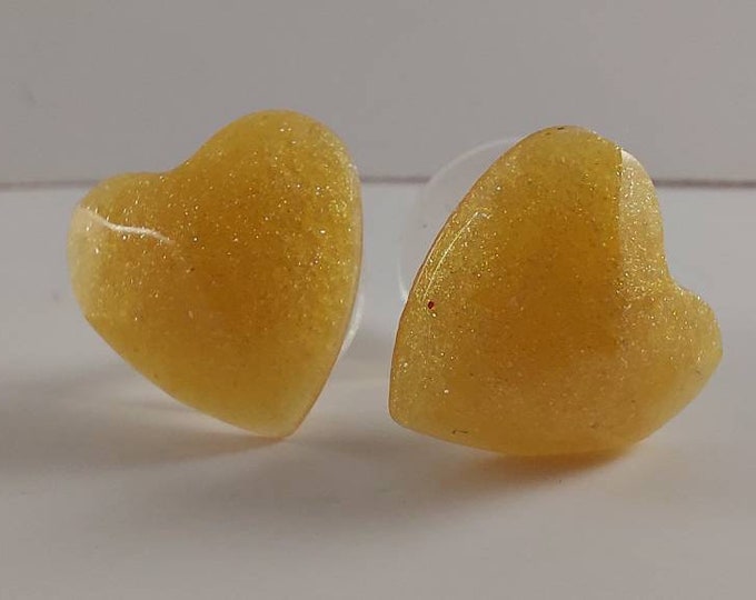 Golden shimmer heart stud earrings