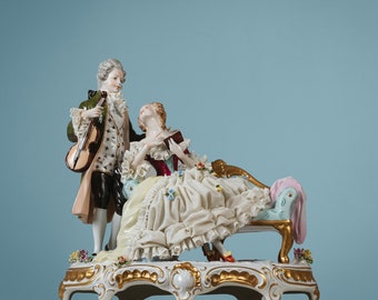 An elegant porcelain figurine couple in Baroque style