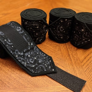 Starstruck Black Horse Polo Wraps | Subtle glitter star print over black fleece | Beautiful on grey, cremello and palomino horses