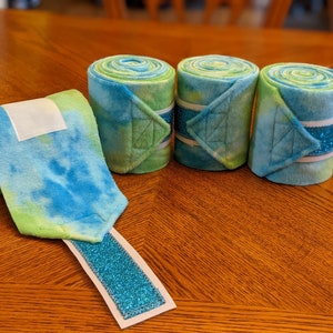 Earth Polo Wraps, Blue and Green tie dye patterned fleece, Beautiful for every shade of horse, with Sparkle Blue Ribbon
