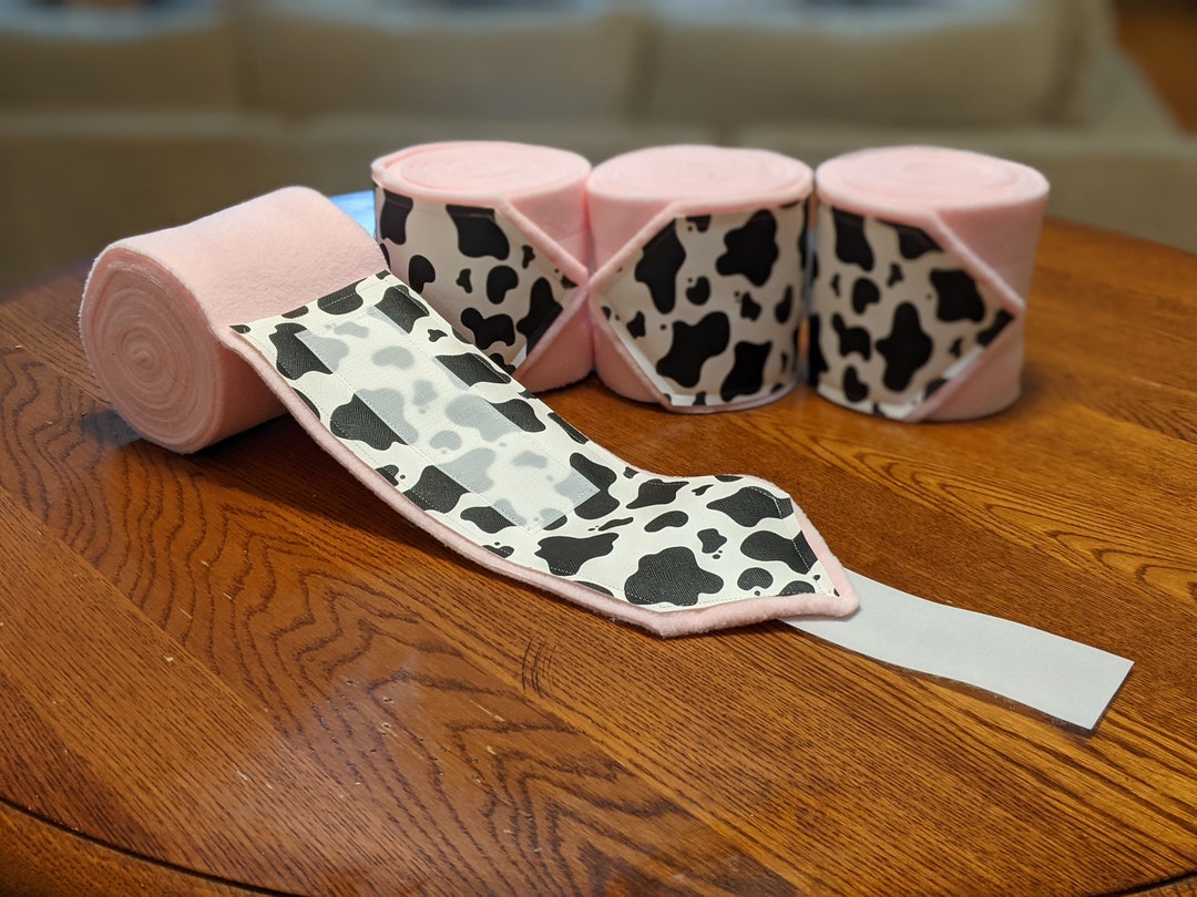 Udderly Adorable Pink Polo Wraps, Cow Print Vinyl Over Baby Pink Fleece