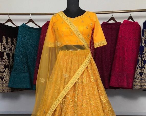 Yellow Haldi mehendi Designer traditional girls Embroidered Net Wedding Wear Lehenga Choli