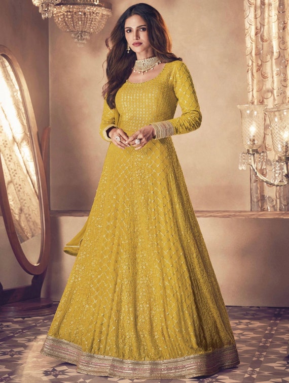 Heavy yellow, navy thread work embroidered mehendi, reception gown