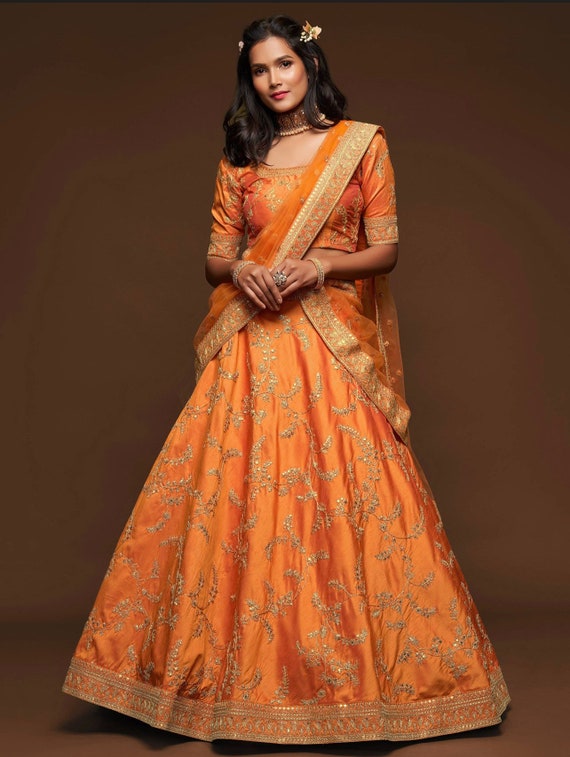 Orange Thread Embroidered Silk Wedding Wear Semi Stitched Lehenga Choli
