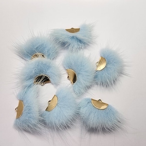 1 pair fur poms,