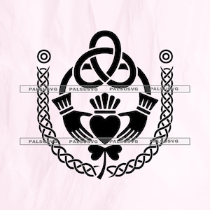 May include: Black Claddagh design featuring a heart held by two hands, topped with a crown, and a shamrock below. The design is surrounded by a Celtic knot and two decorative columns. The design is on a light pink background.