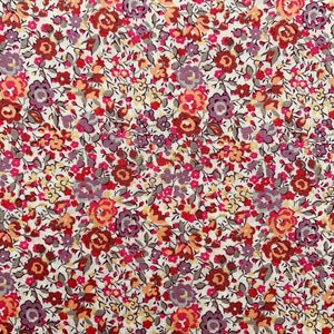 Könnte beinhalten: Ein weißer Stoff mit einem floralen Muster mit kleinen rosa, roten, orangefarbenen und violetten Blüten. Der Hintergrund ist cremefarben.