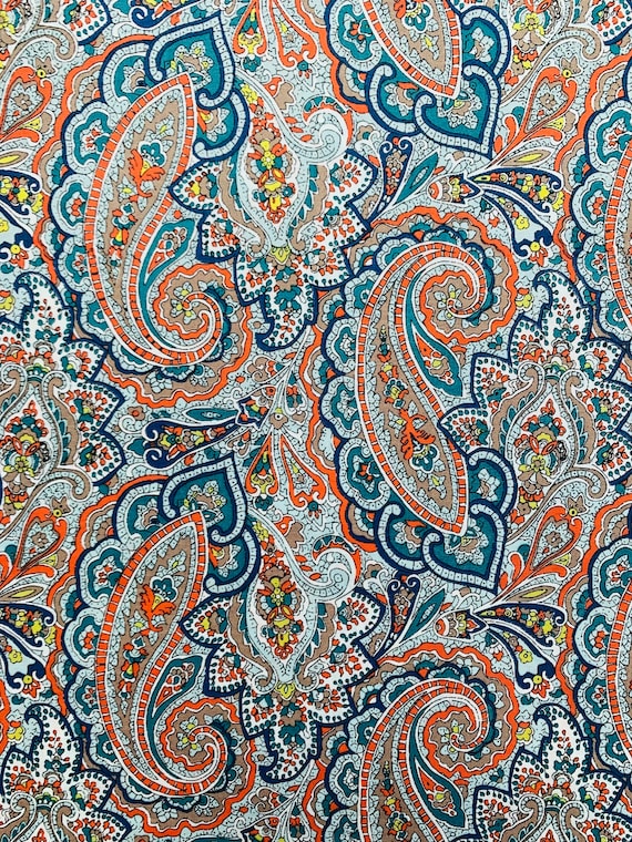Collector’s Corner Discontinued ‘Tessa’ design  of Liberty Tana Lawn. This is a Grey and Orange colour cut to a generous 13 x 14”