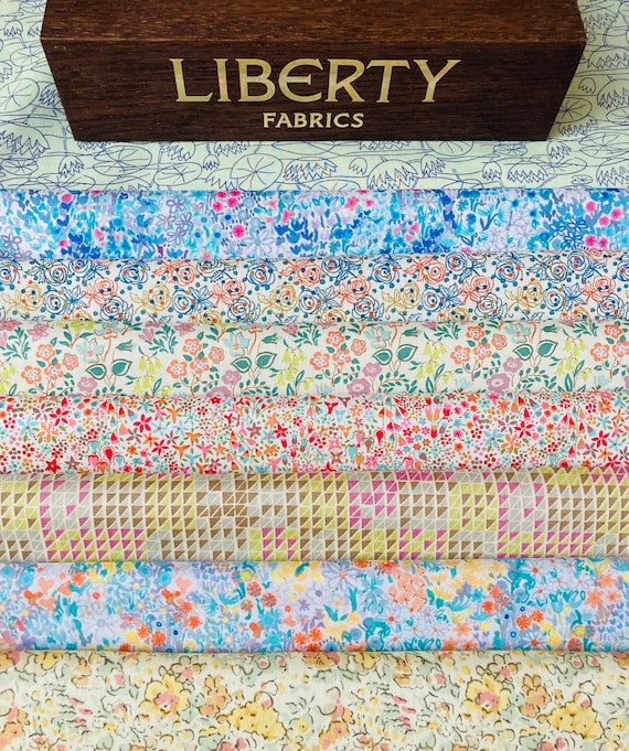 Liberty Tana Lawn Artists selection of a ‘Monet’s Garden’ bundle. This pack contains 8 pieces of 6”x 9” Quality Lawns