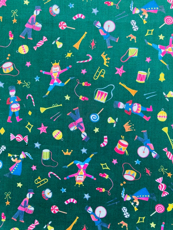 A fun Novelty Green and Pink ‘Tumbling Toys’ Liberty Tana Lawn 13”x 9”