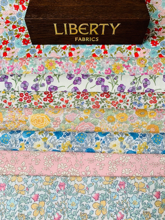 A Beautiful ‘Floral Bouquet’ fabric pack. These packs contain 8 pieces of Liberty Tana Lawn cottons, cut to a generous 6”x 9” size.