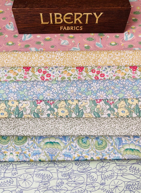 A Beautiful ‘Water Garden’ fabric pack. These packs contain 8 pieces of Liberty Tana Lawn cottons, cut to a generous 6”x 9” size.