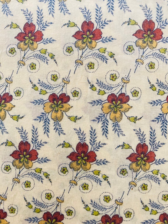 Liberty Tana Lawn, Sian, 13”x 9” Red, Yellow flower on a cream background. Lovely material