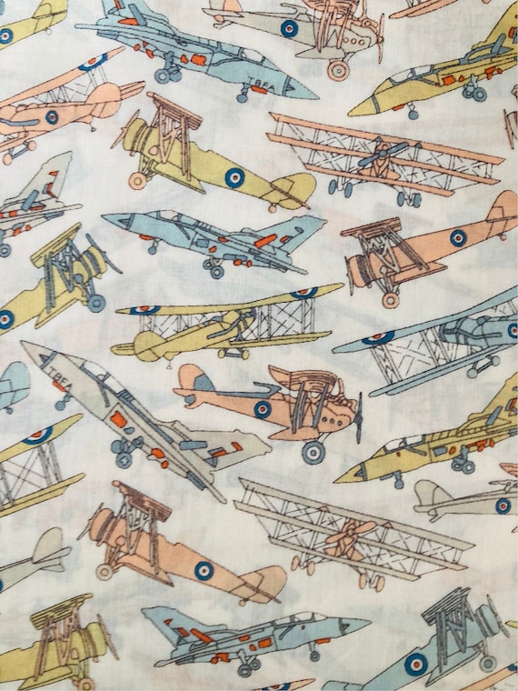 A lovely unusual colourway of Peach and Blue Novelty Liberty Tana Lawn 13”x 9” ‘Tom’s Jet’.