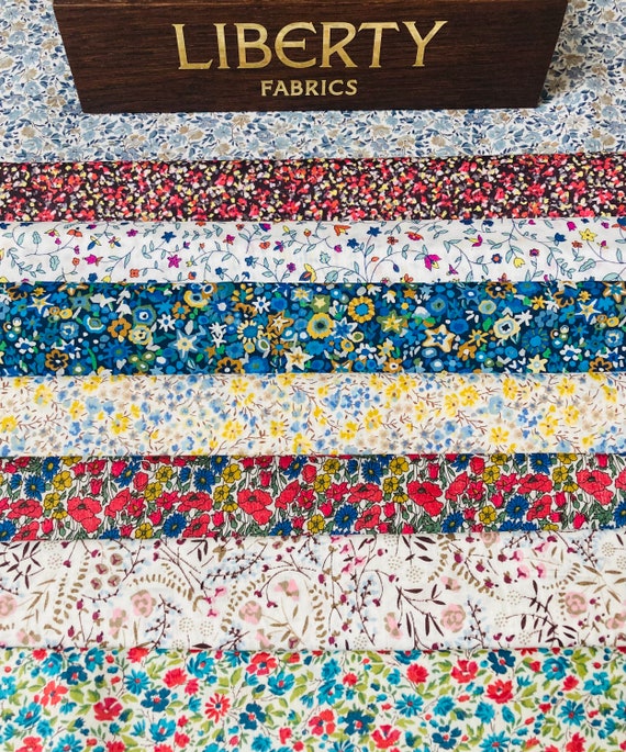 A Beautiful ‘Petites 7’ fabric bag. 8 x Liberty Tana Lawn pieces 6”x 9”.