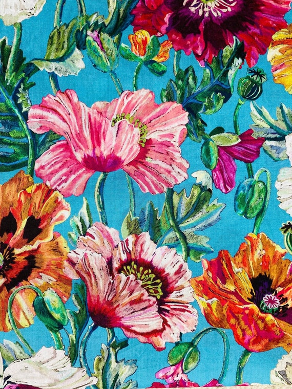 A Turquoise and Pink colourway in this ‘Poppy Amelie’ Liberty Tana Lawn Seasonal Fabric. This piece is cut to 13 x 19”
