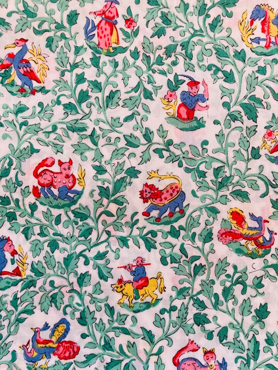 An unusual vintage 1988/90 green and pink ‘Syon’ depicting a Chinese dragon and other figures.A lovely Liberty Tana Lawn cut to 17”x 9 1/2”.