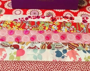 A Beautiful ‘Simply Reds’ fabric pack. These packs contain 8 pieces of Liberty Tana Lawn cottons, cut to a generous 6”x 9” size.