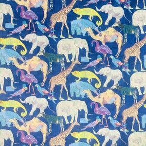 May include: A blue background with a repeating pattern of various animals, including giraffes, elephants, camels, and parrots. The animals are drawn in a whimsical style with bright colors.