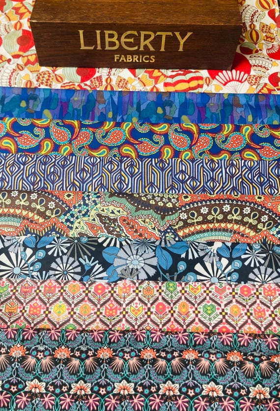 Liberty Tana Lawn fabric pack ‘Fairground’, containing 8 rare and beautiful pieces, sizes are 6”x 9”.