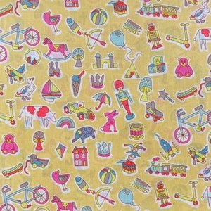 May include: A yellow fabric with a repeating pattern of colorful toys. The toys include a rocking horse, a toy train, a toy robot, a toy crown, a toy airplane, a toy castle, a toy ice cream cone, a toy ball, a toy mushroom, a toy star, a toy scooter, a toy bicycle, a toy drum, a toy rabbit, a toy cow, a toy elephant, a toy bird, a toy arrow, a toy balloon, a toy tent, a toy building block, a toy teddy bear, and a toy skateboard.