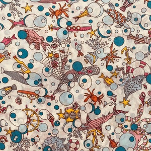 A fun novelty Blue, White and Pink ‘Ocean Treasure’ Liberty Tana Lawn 13”x 9”