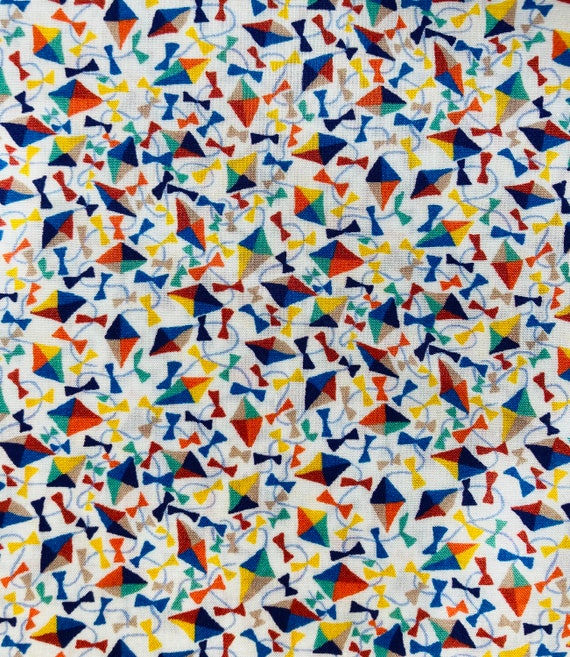 Novelty Multicoloured Blue and Orange Fabric depicting ‘Dancing Kites’ Liberty Tana Lawn. Cut to a generous 13”x 9” #Adele