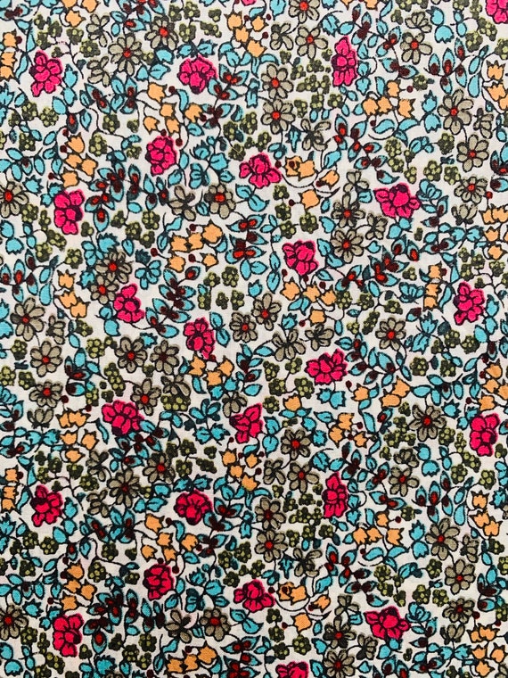 Discontinued ‘Emilia Flowers’ Liberty Tana Lawn 13 x 9 ”. This is a Pink and Green colourway.