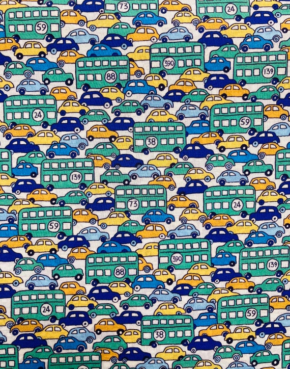 A fun novelty, organic, Blue Green and Yellow ‘Hop On Hop Off’ Liberty Tana Lawn 13”x 9”