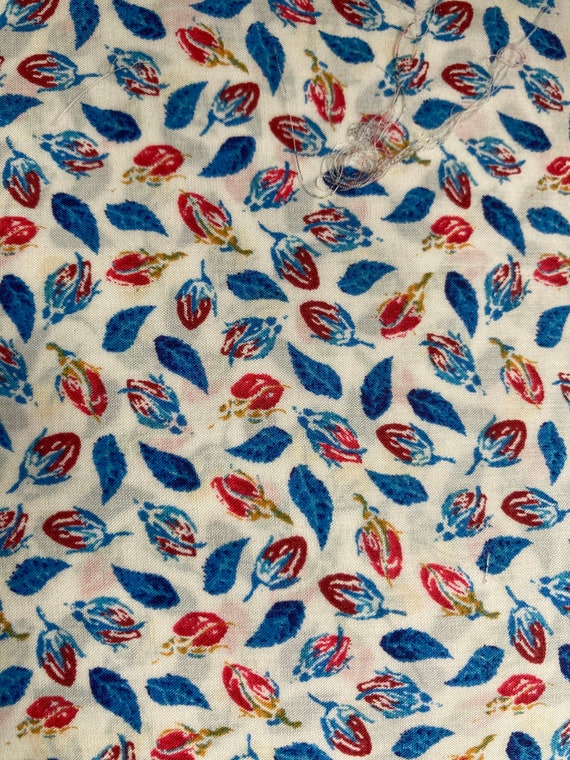 Discontinued ‘Estella and Annabelle’ Liberty Tana Lawn. This is a Blue and Red colourway and is cut to a generous 13 x 9”
