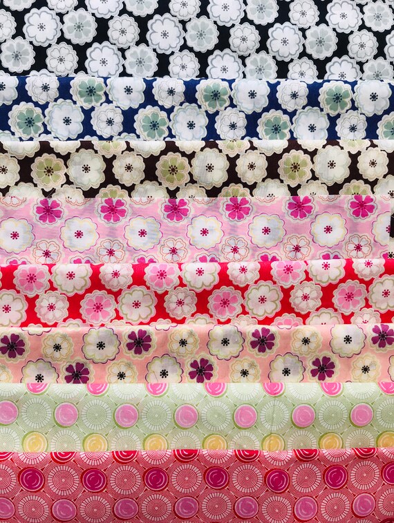 A gorgeous ‘Toria and Richard’ fabric bag. This pack consists of 8, different Liberty Tana Lawn pieces, cut to a generous size of 6”x 9”.