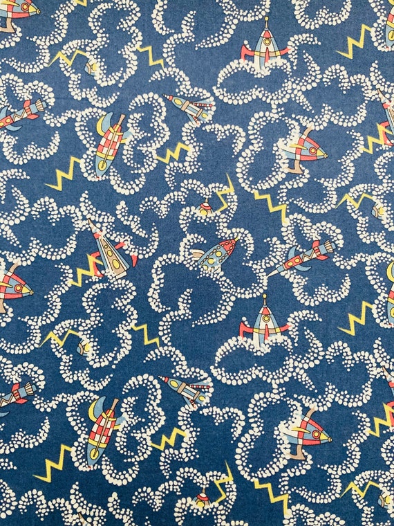 Novelty Dark Blue and White Liberty Tana Lawn Fabric called ‘Rocket Dance’ 13”x 9”. I offer international shipping.