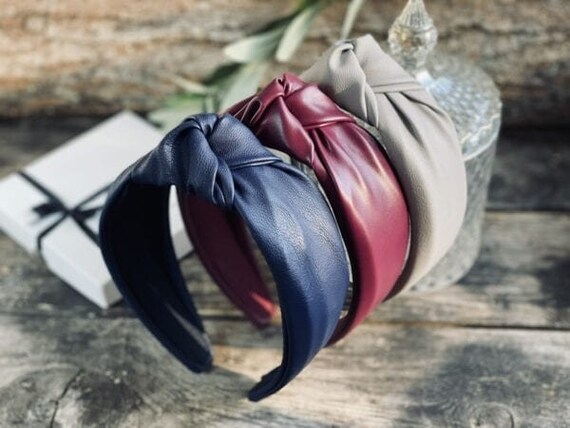 Faux Leather Knotted Headband in Dark Blue Color. Lightly  display picture 1