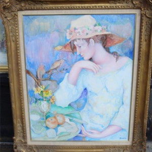 May include: A painting of a woman wearing a straw hat with pink flowers. She is sitting with her arm resting on a table with fruit and flowers. The background is a soft blue and purple.