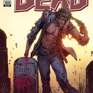 May include: The Walking Dead comic book cover, issue #100, featuring a zombie with a bloody face and a gun, standing near a tombstone with the name "Lori" on it. The cover is in a yellow, orange, and red color scheme.