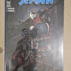 以下が含まれることがあります： ダークでアクション満載のシーンでキャラクターを描いた、Spawnのコミックブックカバー。「Spawn」のタイトルは青色で、スカルが描かれています。270号とクリエイターの名前が表示されています。