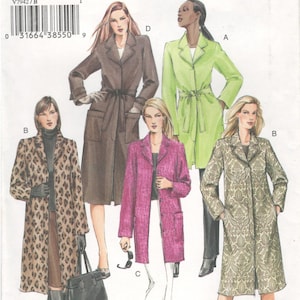 May include: Vogue basic design sewing pattern V7942. The image shows a pattern for women's coats in various styles and colors, including a brown belted coat, a green coat with a tie, and a leopard print coat.