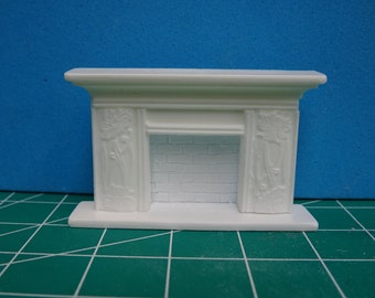 1:48 formal fireplace, a filigree embellished elegant piece for your formal dollhouse.