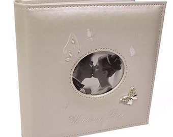 Wedding photo album holds 6 x 4 ins photos butterfly design