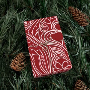 Carta da regalo con cuori rossi vorticosi
