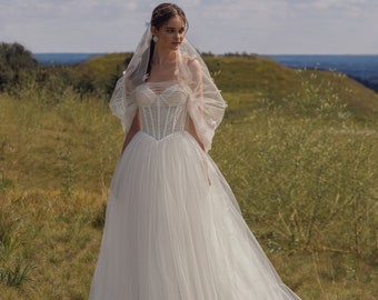 Short off the shoulder draped sleeve Corset Strapless Lace-up closure A-line Sweep train Tulle wedding dress Bridal gown