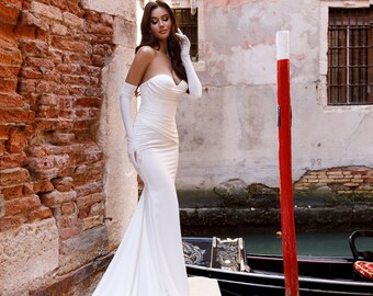 Elegant Fitted Mermaid Fit and flare Minimalist Sleeveless Long Gloves Pleated Bodice Plain Sweep train wedding dress