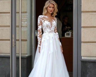 Long Ilusion sleeve V neckline Zip and Button closure Lace decorated bodice A-line court train Tulle wedding dress Bridal gown
