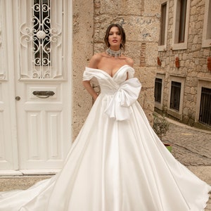 Classic Pleated off the shoulder Bow belt Lace up back A-line Chapel train Plain Satin wedding dress Bridal gown image 1