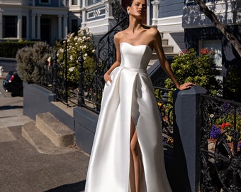 Classic Minimalist Long sleeve asymmetric removable cape Open shoulders A-line Draped Slit skirt Long train wedding dress