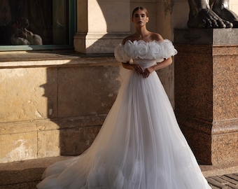 Strapless Sleeveless Sweetheart neckline Removable Voluminous floral bolero Draped bodice A-line Cathedral train Tulle Bridal Wedding dress